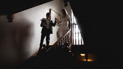 Couple standing on the stairs