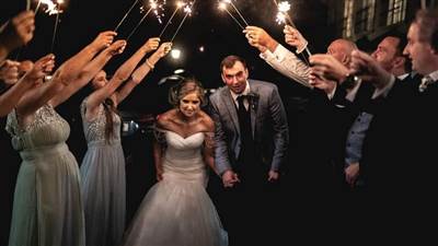 Couple under sparklers at night