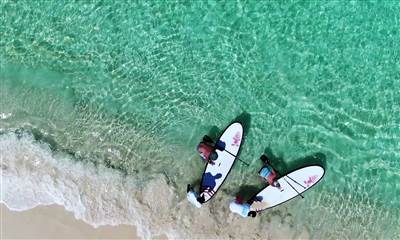Paddle boarding at Carimar Beach Club