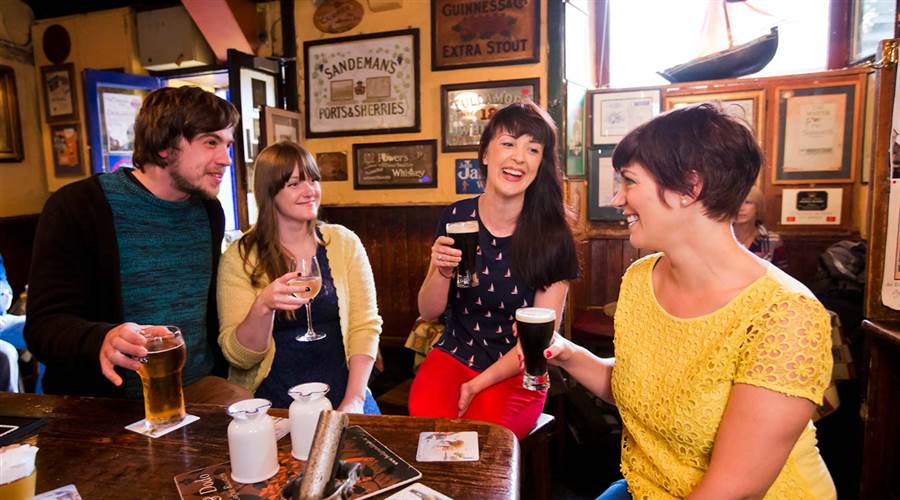 Friends enjoying drinks in Galway