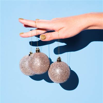 hand holding decoration balls