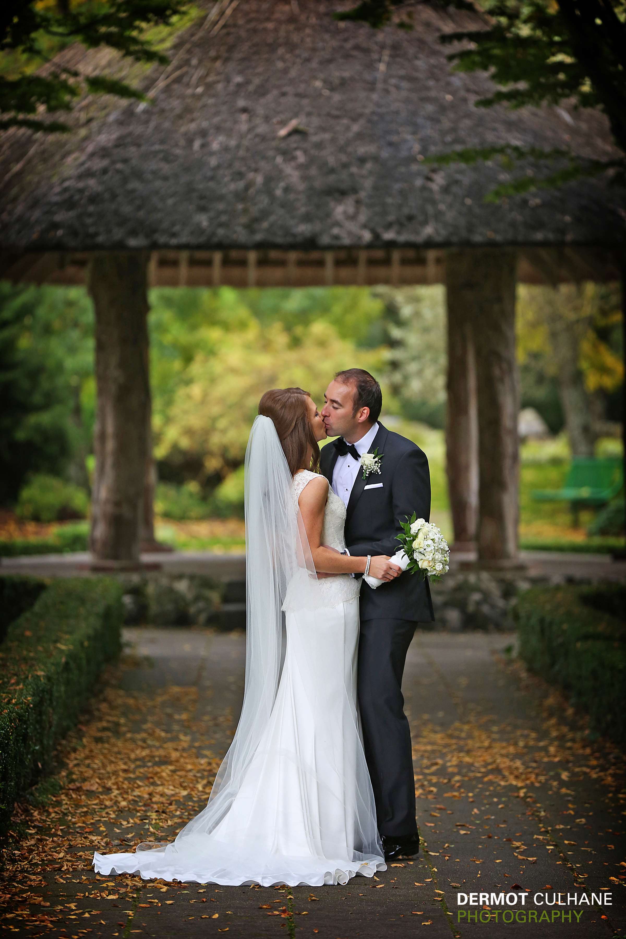 Bride and Groom Kissing at Dunraven Arms Wedding Venue in Adare