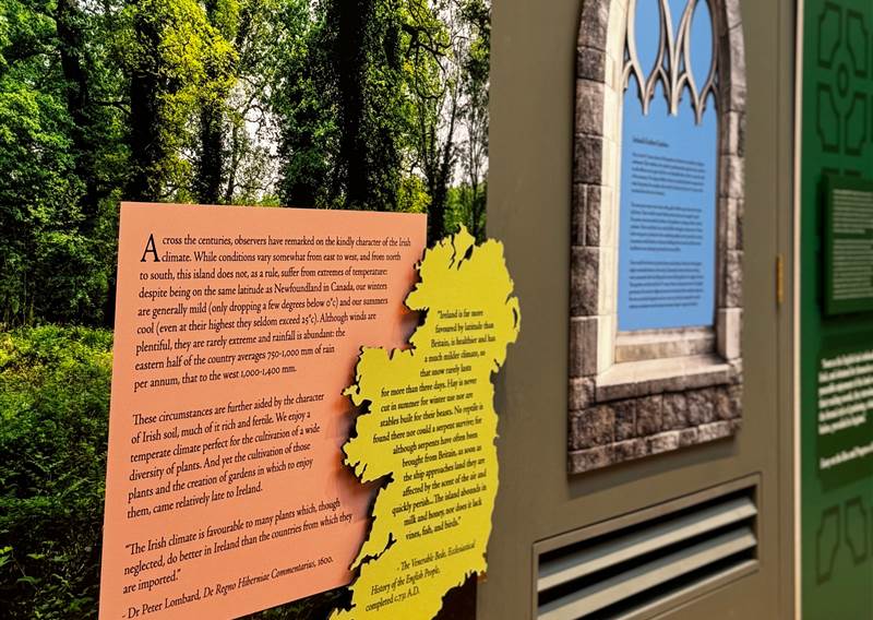 Image of informational signs coloured orange, yellow and blue