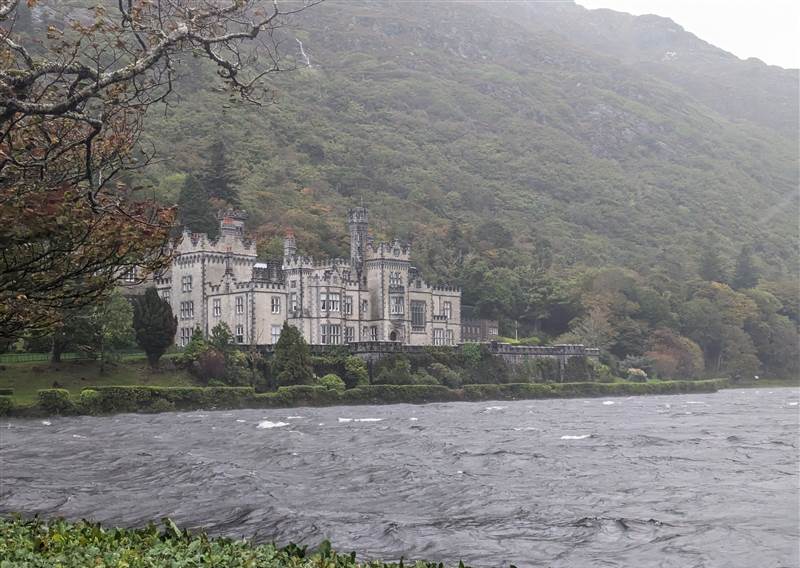 castle sat behind a stormy lake 