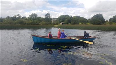 Temple House Lake family boating
