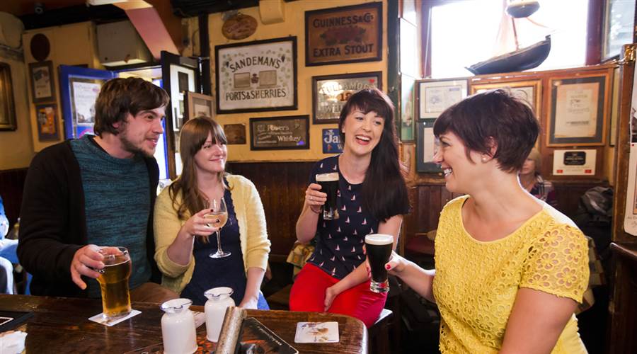 Friends enjoying drinks in Galway